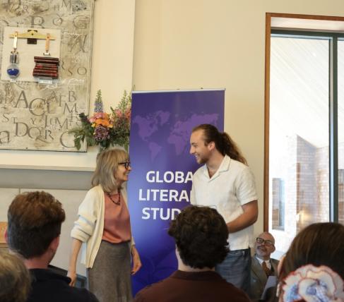 A best Russian language student receiving his award.
