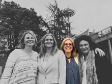 Mira Martinović stands with friends in front of the Space Needle
