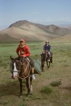 Aidan on horseback alongside his 12-year-old guide, Ali.