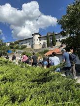 students walking through the medieval hill town of Štanjel, Slovenia