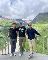 Anton Boudzko, Benjamin Sandow, and Aidan Ruppert at the Gudari View Deck in Georgia