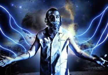 image of poster for the movie Sleep Dealer. A man in a numbered vest is hooked up to numerous neon-colored IVs and has a mask with a tube strapped around his ears and his mouth.