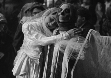 Veiled woman hugging death