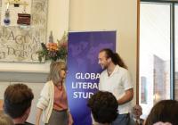 A best Russian language student receiving his award.