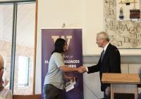 Maddox Unočić receiving his award certification.