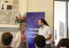 A best Russian language student receiving his award.