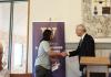 Maddox Unočić receiving his award certification.